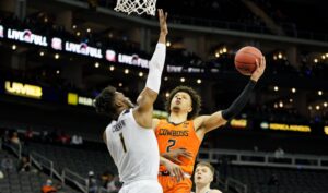 Oklahoma State holds off West Virginia, 72-69, in Big 12 quarterfinals